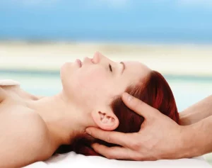 A woman is getting a massage for